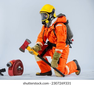 With a sidelong seated position the firefighter exudes a calm and composed demeanor while firmly grasping the iron ax in their hand against the pristine white background.