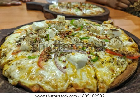 sideshot of pizza in Italian diner macro