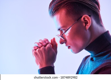 Sideview Portrait Of A Handsome Man In Modern Glasses Looking Forward Purposefully. Men's Accessories, Optics. Business Style. Copy Space.