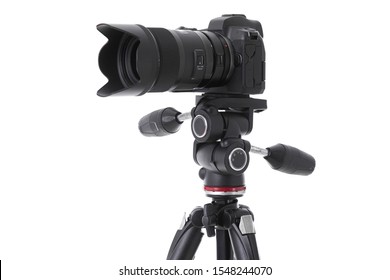 Side-view of professional camera device on tripod isolated