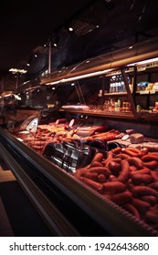 Sideview Of A Stylish Butcher Shop And Its Fridged Counter With Meat