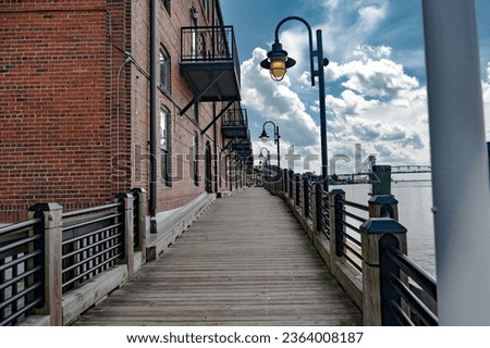 Sidewalk along the waterfront of the Cape Fear River overlooking Memorial Bridge Wilmington, NC