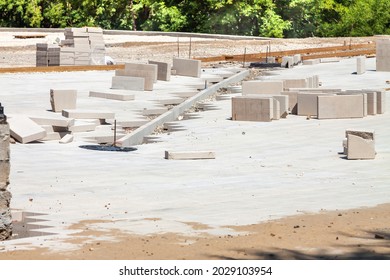 sidewalk concrete pavement bricklaying construction with square stone blocks outdoor backgrounds