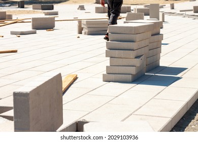 sidewalk concrete pavement bricklaying reconstruction with square stone blocks outdoor backgrounds