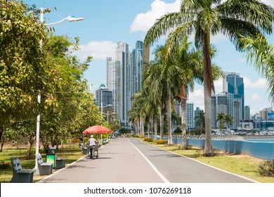 Sidewalk in public park at ocean Promenade and skyline background in Panama City ( Avenida Balboa) - Powered by Shutterstock