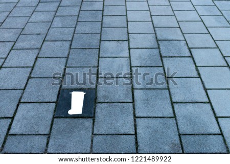 sidewalk tiles with garbagecan tile
