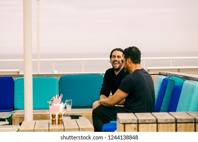 Sidney, Australia-October 17,2018: Friends Chat At A Bondi Beach Bar.