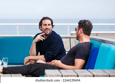 Sidney, Australia-October 17,2018: Friends Chat At A Bondi Beach Bar.