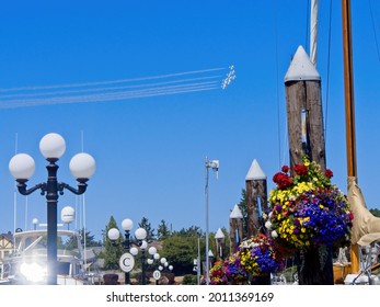Sidney BC, Canada - July 19, 2021. Snowbirds air jets fly in formation over Sidney BC during Operation Inspiration to honor healthcare workers helping stop spread of Covid-19