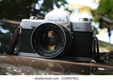 SIDOARJO, INDONESIA - May 05, 2022: Minolta SR-1 with MC Rokkor-PF 1:1.4 f=58mm vintage 35mm analog film camera, launched in 1966.