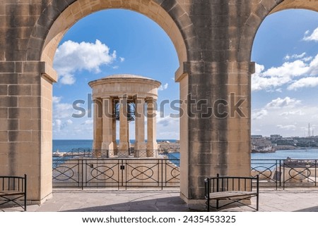 The Siege Bell War Memorial seen from Lower Barrakka Gardens, Valletta, Malta