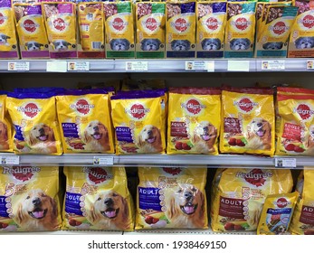 SIEM REAP, CAMBODIA - APRIL 28, 2020: Various Pedigree products for sale at a local supermarket. Pedigree Petfoods is a subsidiary of the American group Mars, Incorporated specializing in pet food.