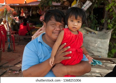 Siem Reap, Cambodia- december 2018: cambodian father and doughter
