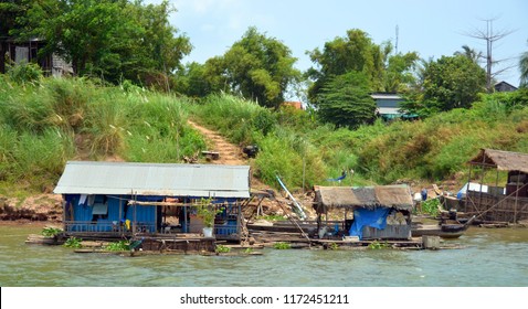 SIEM REAP CAMBODIA MARCH 30: Typical Homes In A Village On The Bank Of The Tone Sap River On March 30 2013 In Siem Reap Cambodia