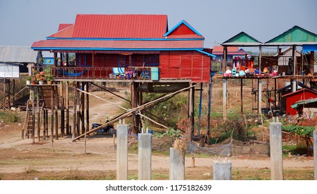 SIEM REAP CAMBODIA MARCH 30: Typical Homes On Stilts On The Bank Of The Tone Sap River On March 30 2013 In Siem Reap Cambodia