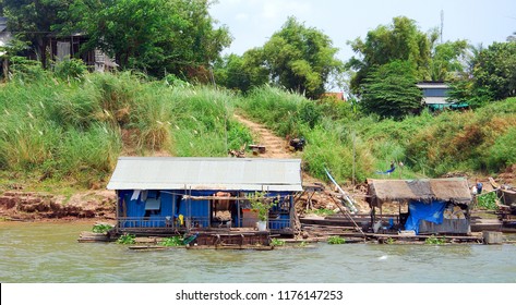 SIEM REAP CAMBODIA MARCH 30: Typical Homes In A Village On The Bank Of The Tone Sap River On March 30 2013 In Siem Reap Cambodia