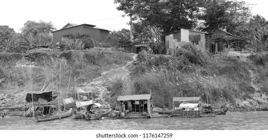 SIEM REAP CAMBODIA MARCH 30: Typical Homes In A Village On The Bank Of The Tone Sap River On March 30 2013 In Siem Reap Cambodia