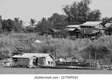 SIEM REAP CAMBODIA MARCH 30: Typical Homes In A Village On The Bank Of The Tone Sap River On March 30 2013 In Siem Reap Cambodia