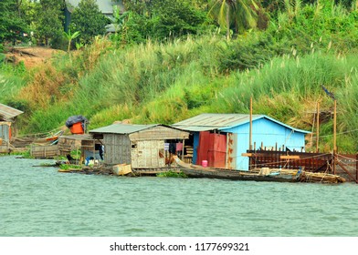 SIEM REAP CAMBODIA MARCH 30: Typical Homes In A Village On The Bank Of The Tone Sap River On March 30 2013 In Siem Reap Cambodia