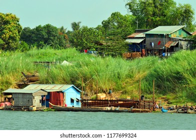 SIEM REAP CAMBODIA MARCH 30: Typical Homes In A Village On The Bank Of The Tone Sap River On March 30 2013 In Siem Reap Cambodia