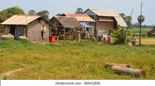 SIEM REAP CAMBODIA MARCH 30: Typical Homes In A Village On The Bank Of The Tone Sap River On March 30 2013 In Siem Reap Cambodia