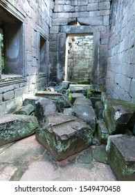 SIEM REAP - CAMBODIA - OCTOBER 13, 2019: Preah Khan, A Large Temple Complex At Angkor Archaeological Park, Has Four Gates With Stunning Khmer Architecture Ruins And Stupa With Direct Sunlight.