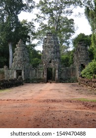 SIEM REAP - CAMBODIA - OCTOBER 13, 2019: Preah Khan, A Large Temple Complex At Angkor Archaeological Park, Has Four Gates With Stunning Khmer Architecture Ruins And Stupa With Direct Sunlight.