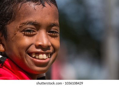 Siem Reap, Siem Reap Province, Cambodia - November 24 2015 : Portrait Of A Young Boy At The Bon Om Touk Water Festival On The Tonle Sap River In Siem Reap