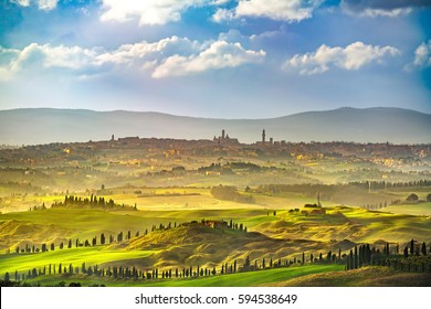 Siena city panoramic skyline, countryside and rolling hills in a misty day. Tuscany, Italy, Europe. - Powered by Shutterstock