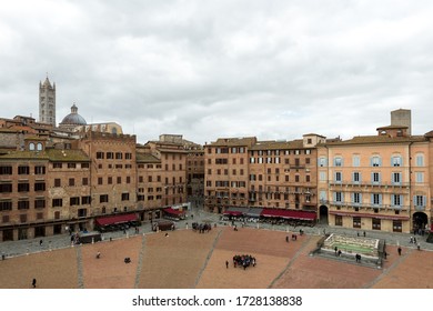 SIENA, ITALY - 13, MARCH, 2018: Horizontal Picture Of Piazza Del Campo From Torre Del Mangia, A Huge Plaza In Siena, Italy