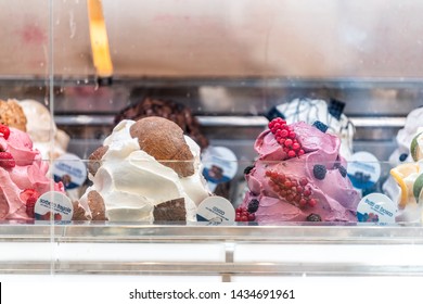 Siena, Italy - August 27, 2018: Ice Cream Frozen Yogurt Gelato Colorful Serving Counter Parlour With Many Scoopable Flavors