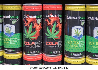 Siena, Tuscany, Italy - January 31, 2020: Legal cannabis drinks cans, with CBD, for sale on a store shelf