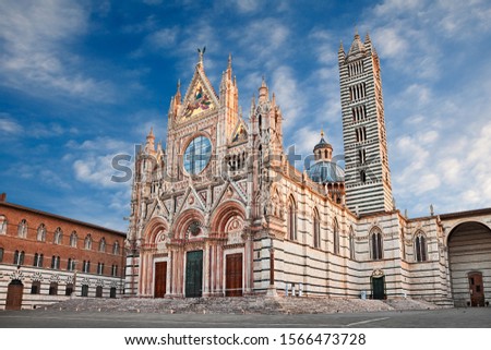 Siena, Tuscany, Italy: the medieval cathedral at sunrise, a marvelous ancient church built in Gothic Roman style with precious marble
