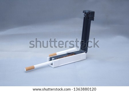 A sigaret rolling machine is a machine that is designed to roll either tobacco, cannabis, or other products such as synthetic cannabis into individual cigarettes or joints