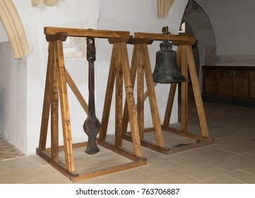 Sighisoara, Romania, October 08, 2017 : The bell and the hanging hang on the stand in the Church of the Deal (St. Nicholas) in the castle in Old City. Sighisoara city in Romania