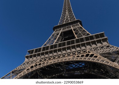 sight of central part of Eiffel Tower against blue sky