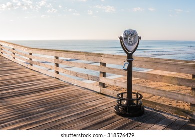 Sightseeing Binoculars with Beach Background on the Virginia Beach Fishing Pier - Shutterstock ID 318576479