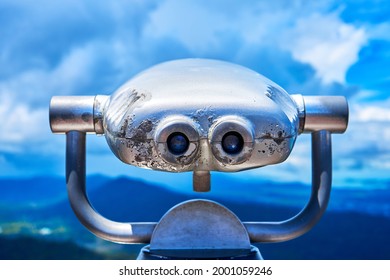 Sightseeing binoculars at the observation deck.