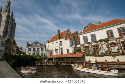 Sightseeing Boat In Bruges Canal