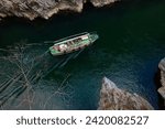 Sightseeing boat in rush water river at OBOKE Gorge in Miyoshi, Tokushima, Japan.