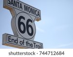 Sign 66 SANTA MONICA, CALIFORNIA : Beach goers at the Santa Monica Pier on Ocean Ave. in Santa Monica, California.close up