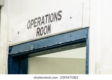 Sign above the door of an Operations Room - Shutterstock ID 2395471001