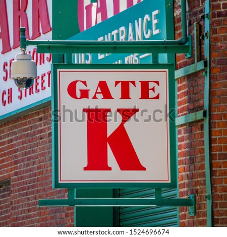 A sign above an entry gate to the baseball park in Boston
