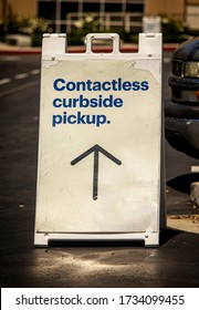 Sign Advertising Contactless Curbside Pickup At Retail Store Parking Lot