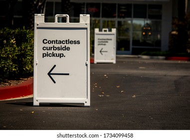 Sign Advertising Contactless Curbside Pickup At Retail Store Parking Lot