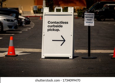 Sign Advertising Contactless Curbside Pickup At Retail Store Parking Lot