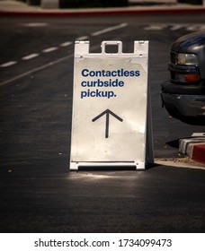 Sign Advertising Contactless Curbside Pickup At Retail Store Parking Lot