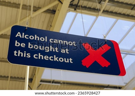 Sign advising customers that alcohol cannot be purchased at this checkout (Northern Ireland Licencing laws)