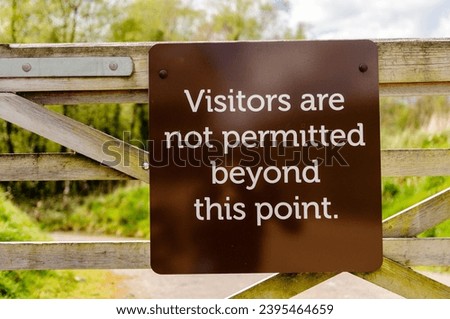 Sign advising that visitors are not permitted beyond this point
