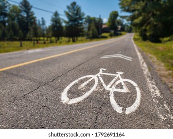 Sign Of Bike Path On The Pavement In Quebec Countryside, Canada